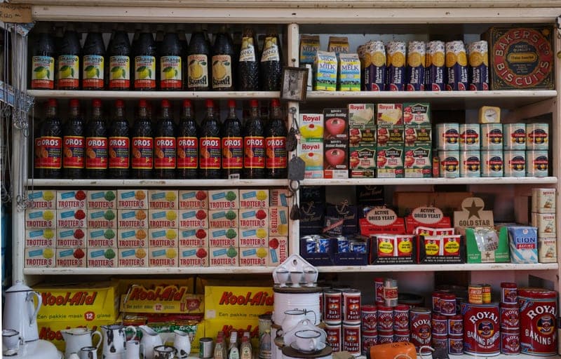 Pantry shelves lined with jars, cans and packets — the cupboard mice raid first